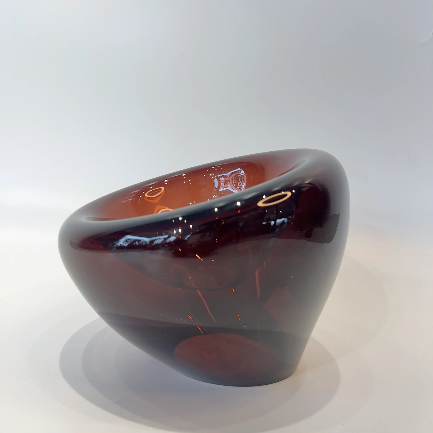 Decorative Glass bowl with a gradient color from brown to black on a white background available at FabCuro, best home decor store in Bangalore