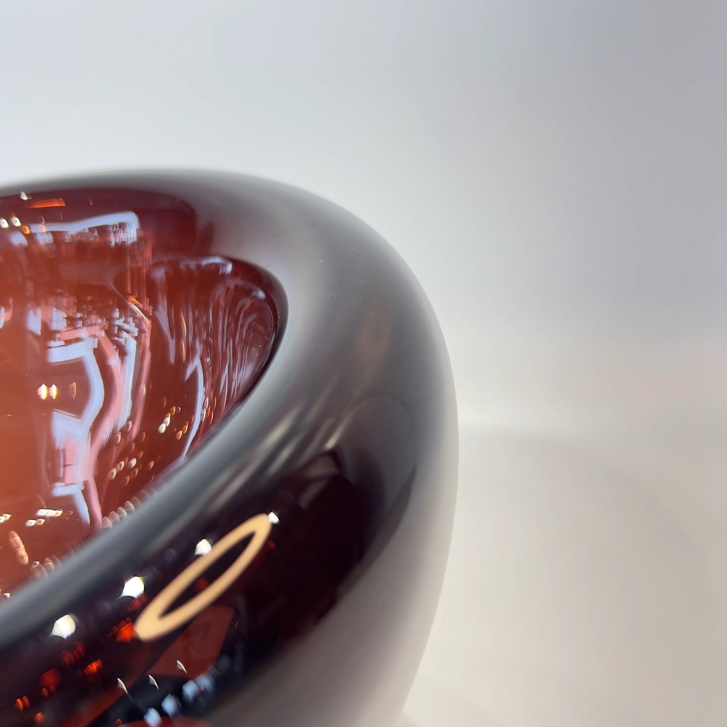 Close-up of a reflective surface with a blurred background of a decorative decor