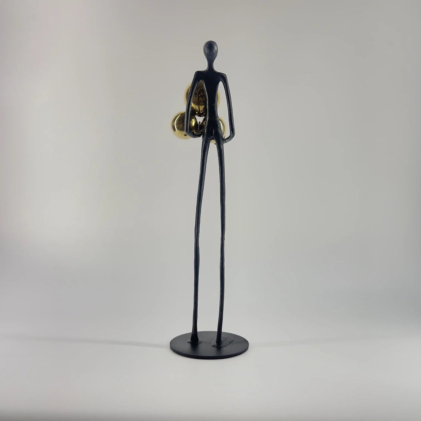 Statue Poses Golden Ball xy
