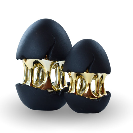 Golden hatch sculpture black polyresin sculpture with gold interior for modern home decor