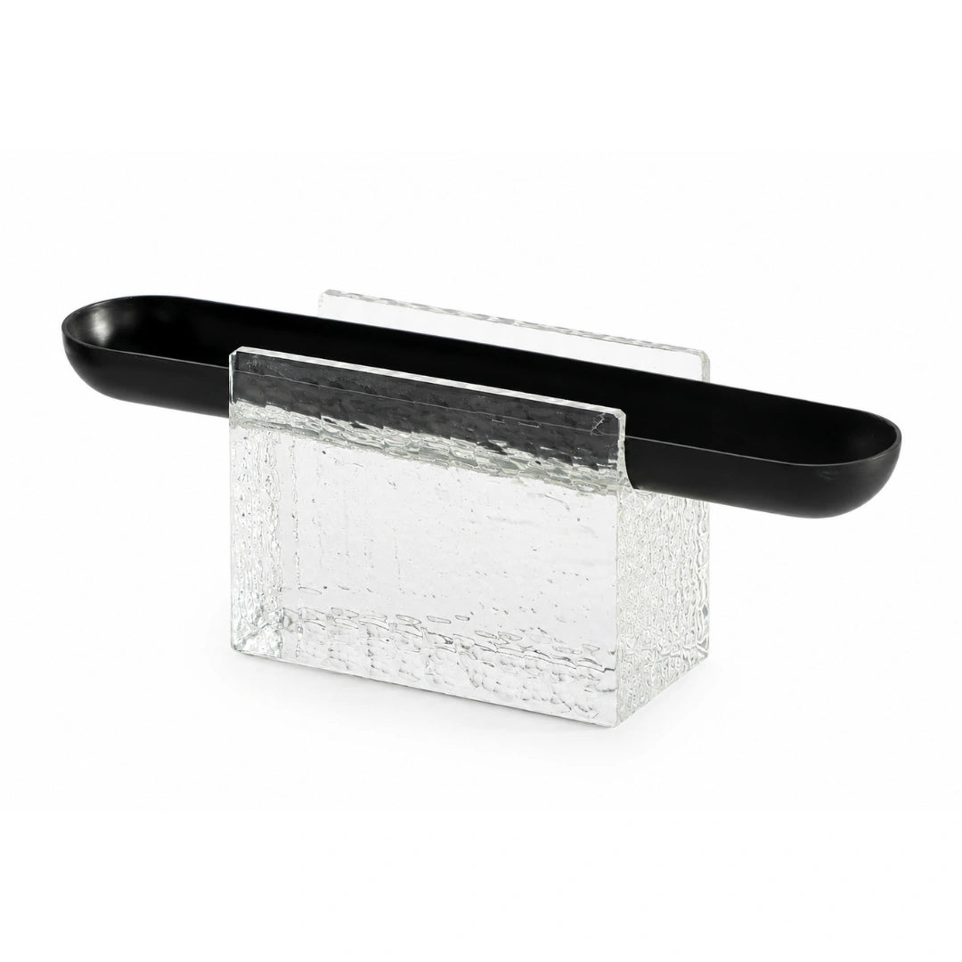 The Mystic Crystal Tray combines a sleek metal tray with a textured crystal glass base, creating a striking balance of functionality and contemporary design.